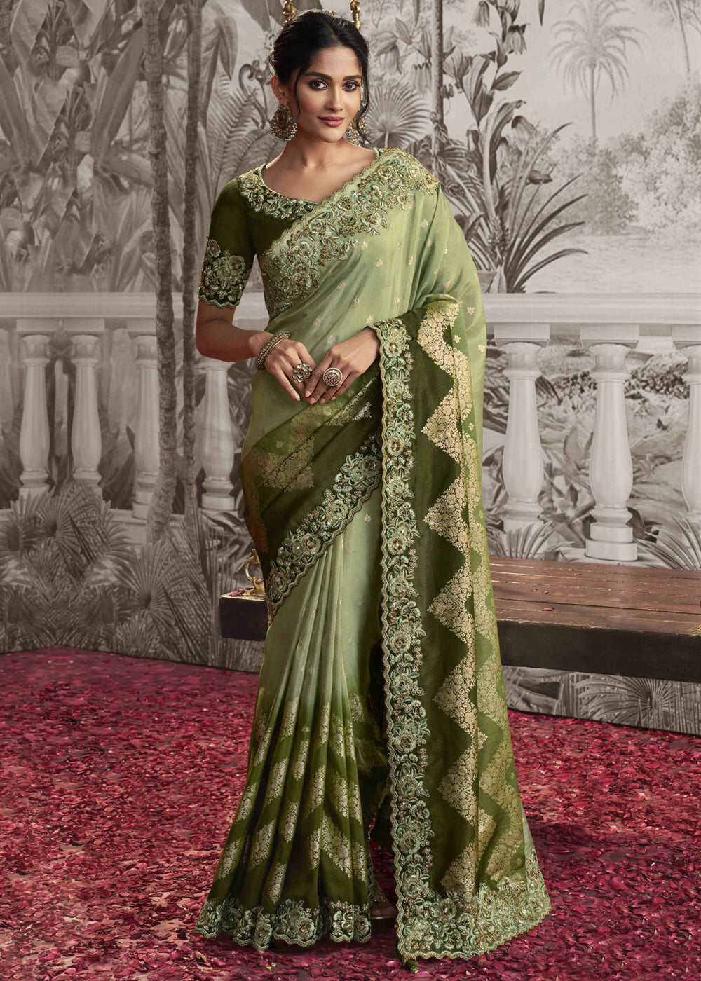 Best embroidered green color wedding saree with a contrast blouse.