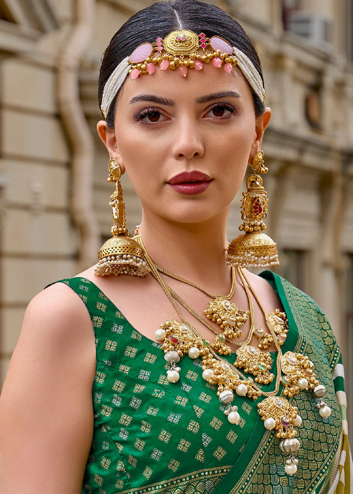 Festive Green Printed Patola Saree With Blouse