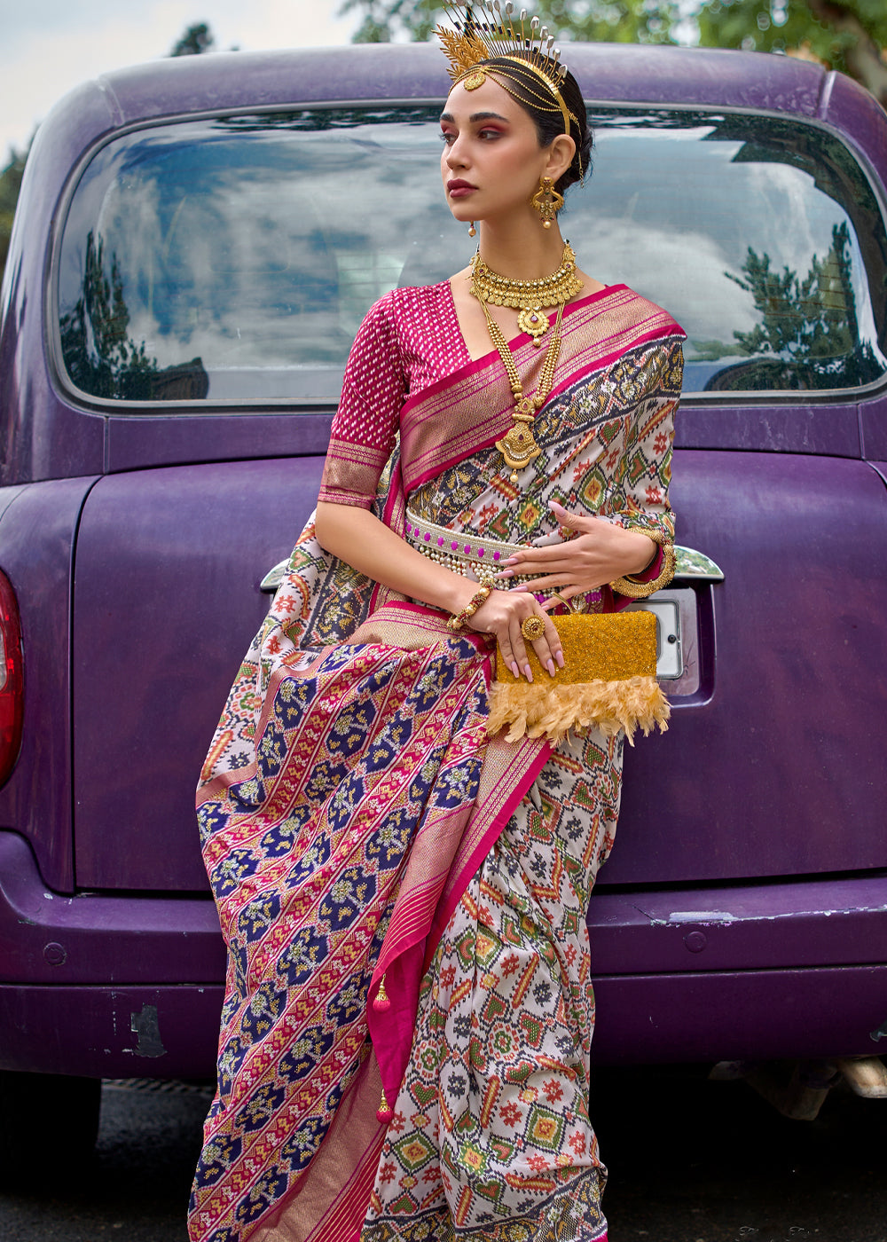 Adorning White/Pink Printed Patola Saree With Contrast Blouse