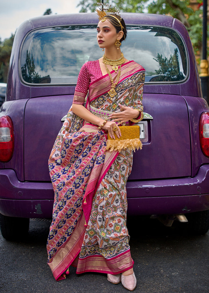 Adorning White/Pink Printed Patola Saree With Contrast Blouse