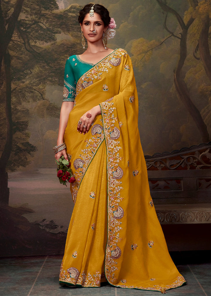 Dusky Yellow Heavy Embroidered Designer Silk Saree