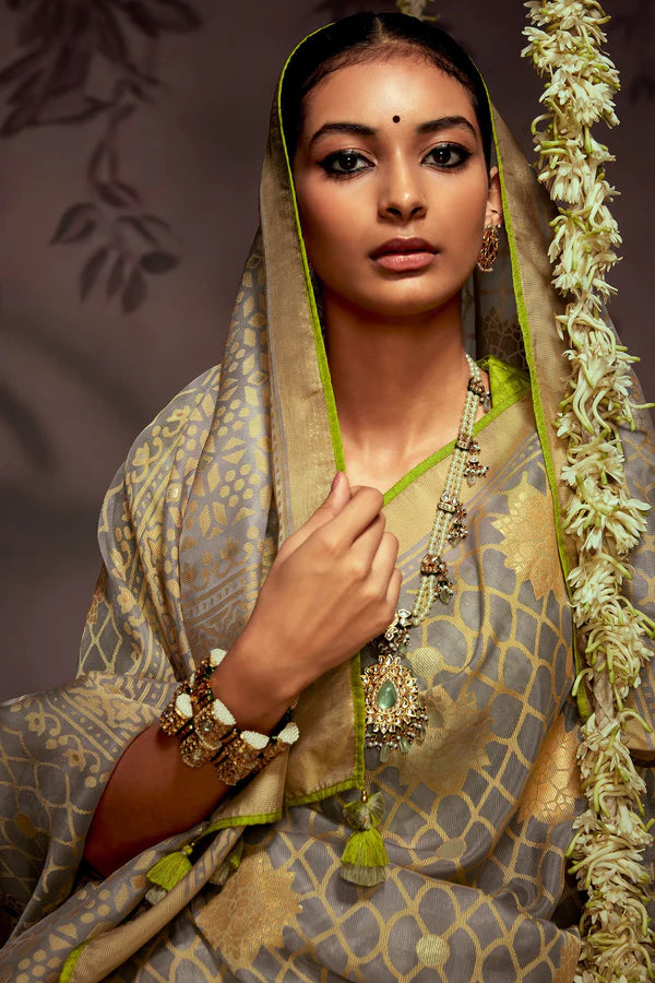 Pretty Grey And Paarrot Woven Brasso Saree